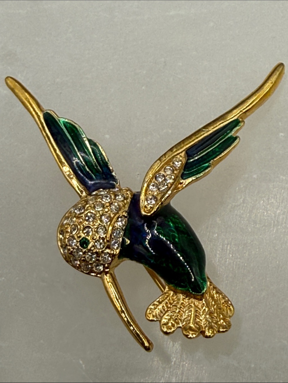 Vintage Roman Gold-tone Green Hummingbird Brooch with pave rhinestones
